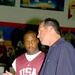 Mark Gottfried explains the game strategy to a player