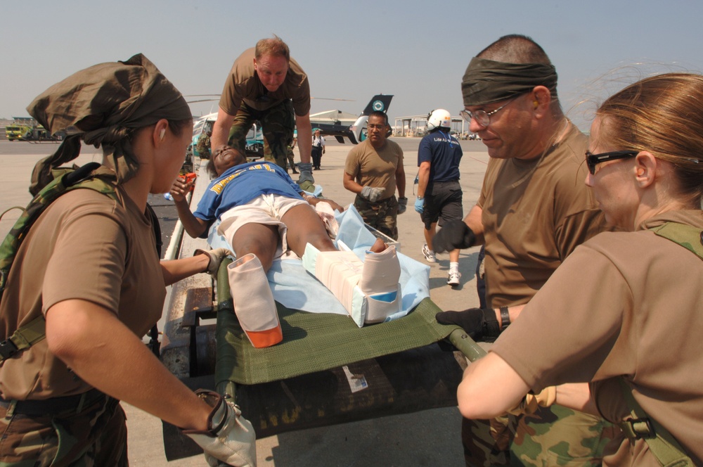 Victims of Hurricane Katrina are airlifted into New Orleans International A