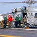 USS Harry S. Truman (CVN 75) Air Department personnel load Meals Ready-to-E