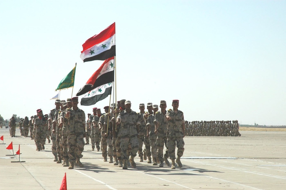 The Iraqi colors pass in review at the IED graduation ceremony