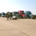 Trucks await on tarmac