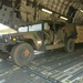 Humvee unloaded onto tarmac