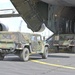 Equipment and troops from the Ohio National Guard load into a C-5