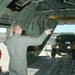 TSGT Gurnan assists in the loading of vehicles in a C-130