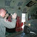 TSGT Gurnan assists in the loading of vehicles in a C-130