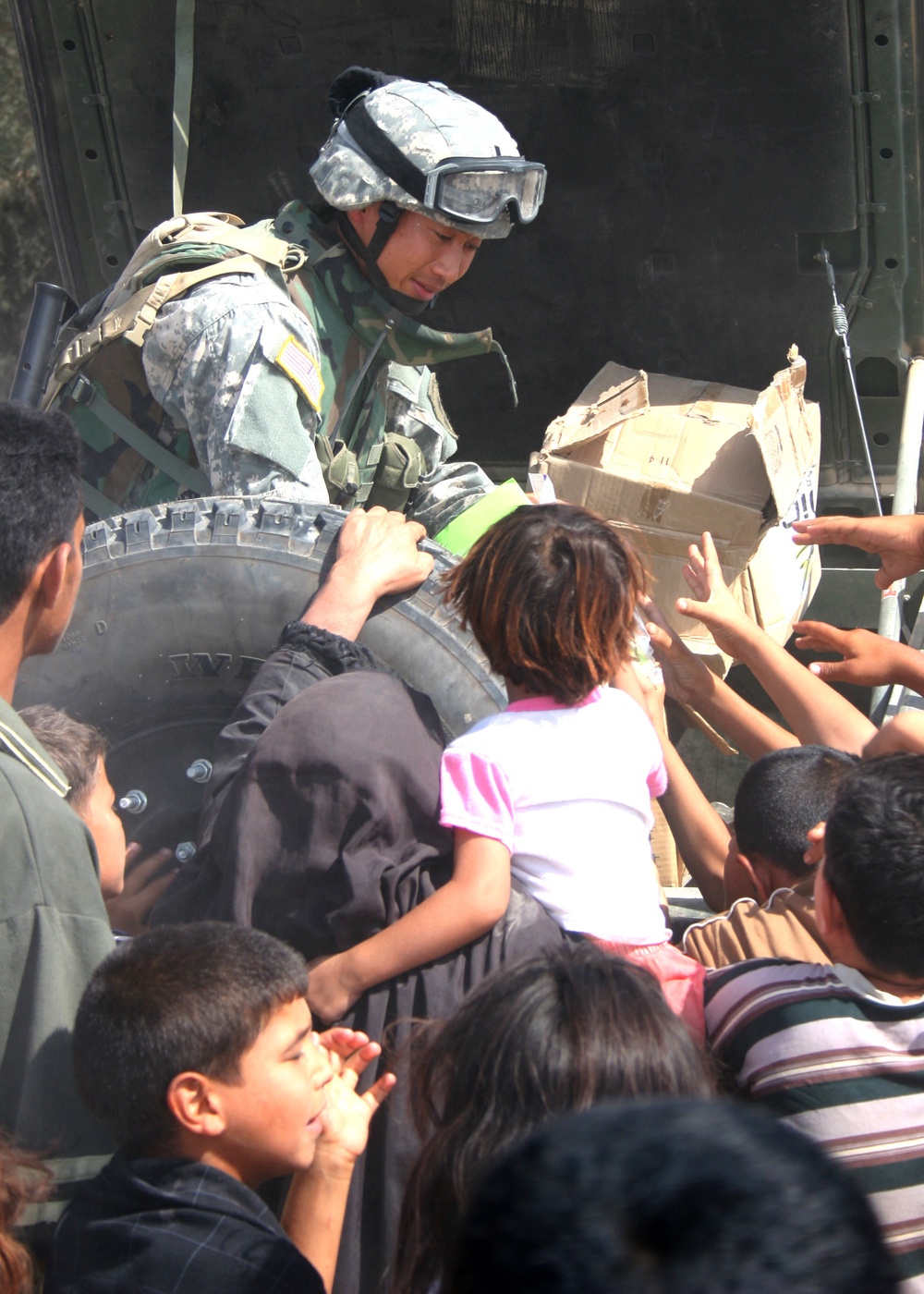 1st Lt. Dimayuga delivers shool uniforms and supplies