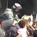 1st Lt. Dimayuga delivers shool uniforms and supplies