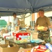 Spc. Seth A. Anderson distributes diapers, baby food, formula and other per