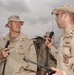 Lt. Michael Colom gives some advice to Spc. Jarrod Stranahan