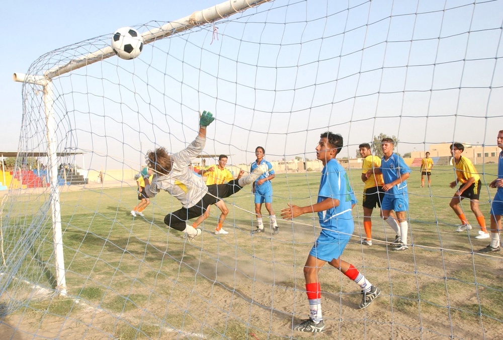 A goal is scored by an Iraqi soccer (football) player