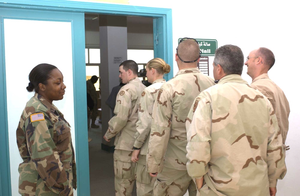 Soldiers enter the newly opened Bright Star Post Exchange