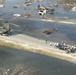 Members of a FEMA Search and Rescue Team Prepare to Board a CH-47 Chinook H