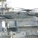 A Helicopter sits atop of the USS Iwo Jima