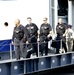 Police Officers Leaving the USS Iwo Jima.