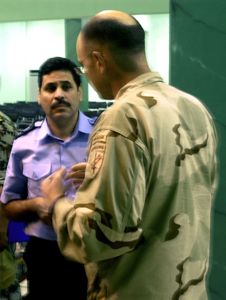 Col. Joe Schroeder converses with Egyptian Navy Cmdr. Aladdin Mokhter