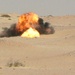 A fireball erupts from a detonating brick of Composition-Four