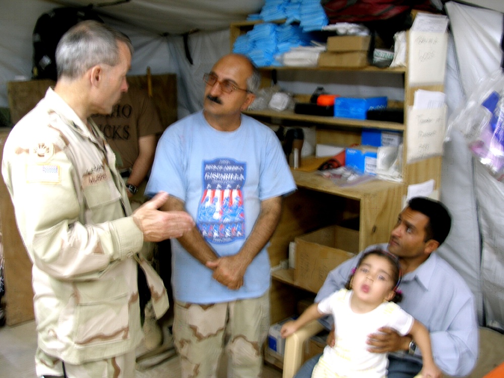 Col. Murphy speaks with Yousif Ahbed Hussein Abdul Karim