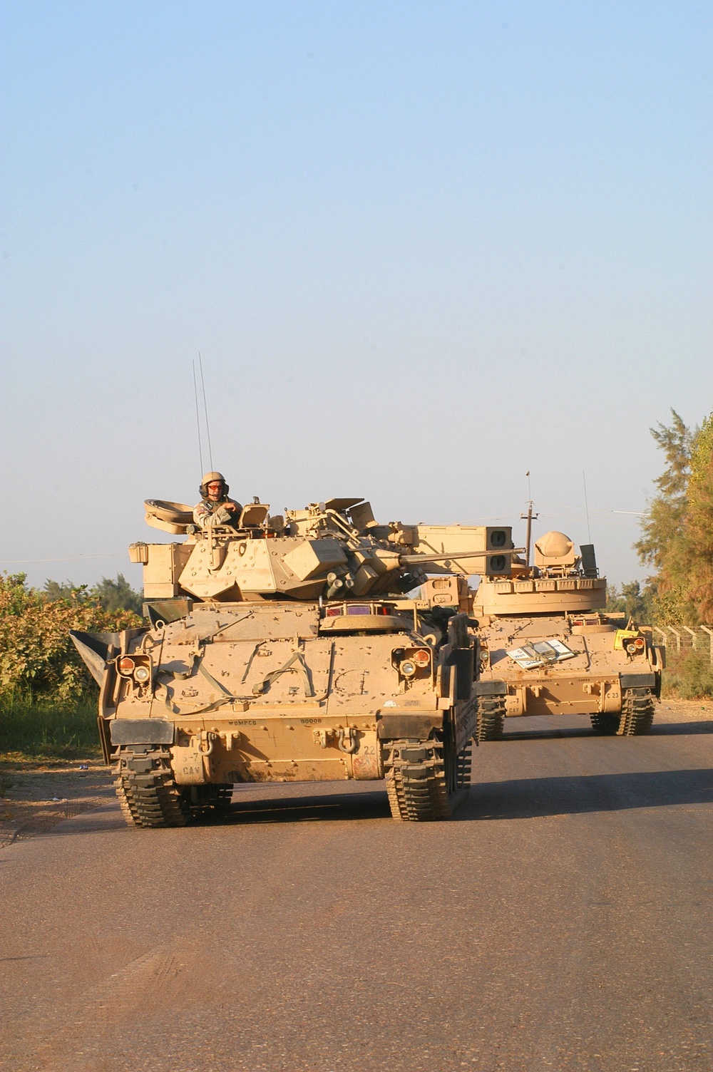 Bradley Fighting Vehicles post guard during a spontaneous vehicle check