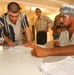 An Iraqi male registers to vote in Balad