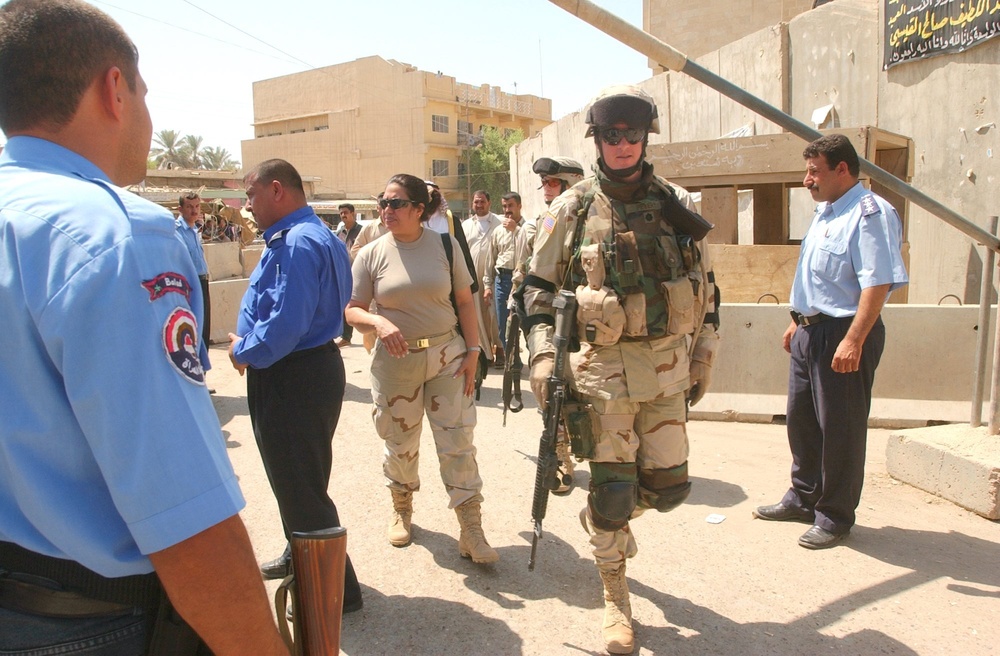 Lt. Col. Petery returns from a meeting with the police chief of Balad