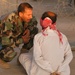 An Iraqi soldier questions a detainee