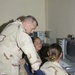 Brig. Gen. Fontaine learns about instant messengers from two young sergeant