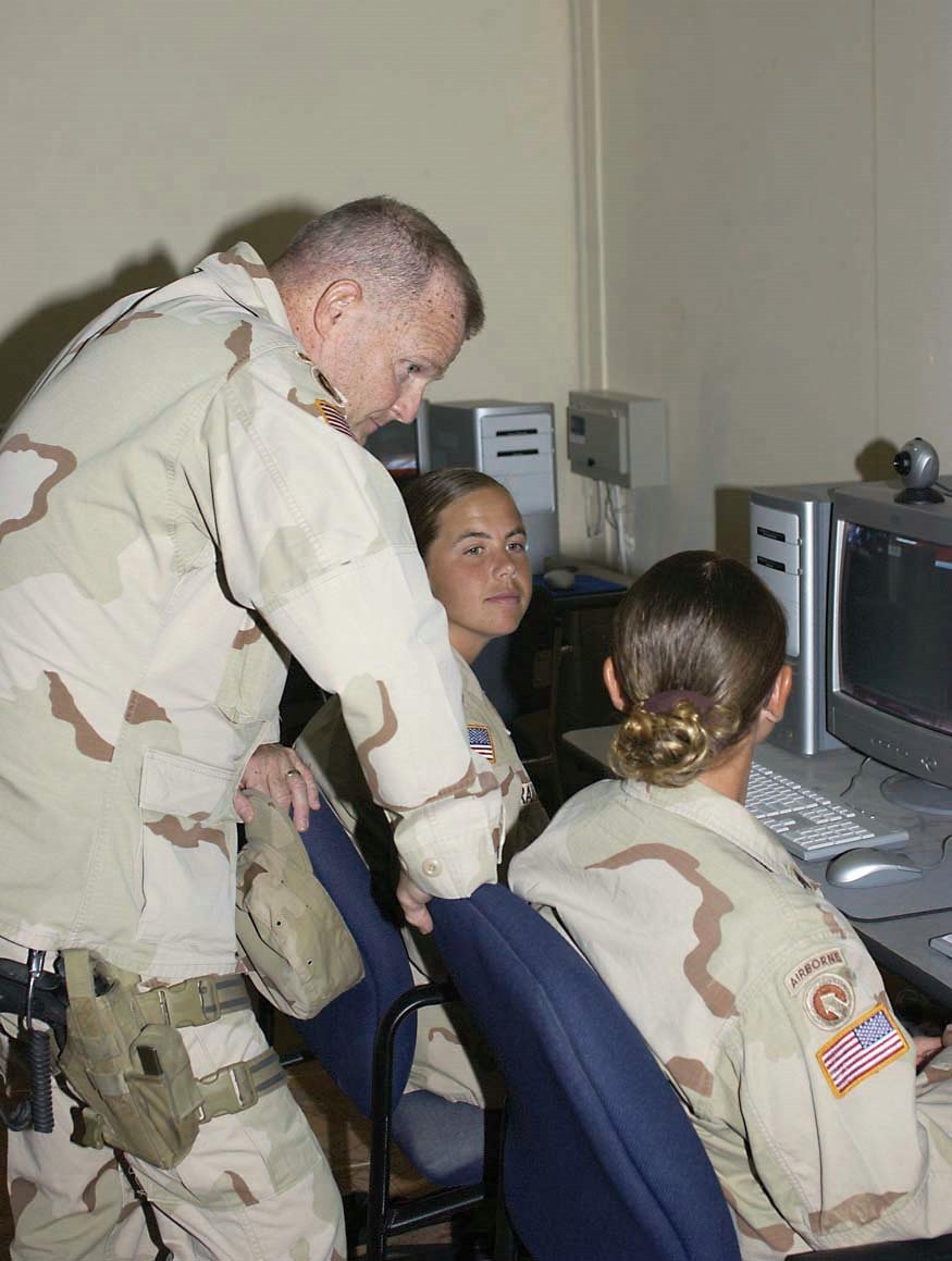 Brig. Gen. Fontaine learns about instant messengers from two young sergeant