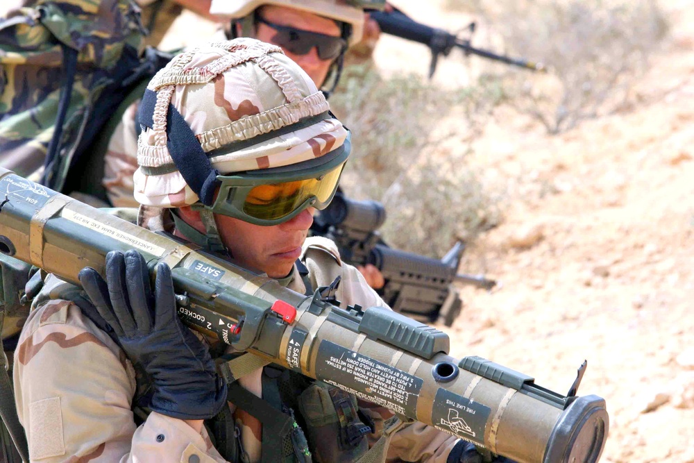 A Dutch Army Soldier advances with his anti-tank weapon