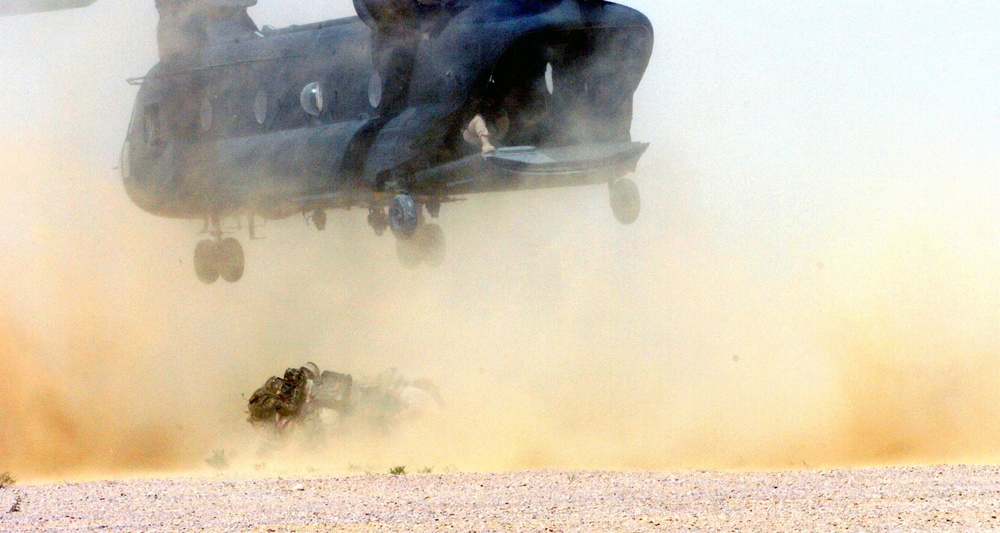 Members of Dutch NL Air Assault Task Force are covered in Egyptian sand