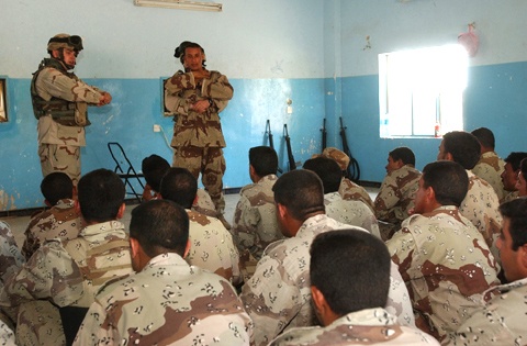 Spc. Italiano and Spc. Hardwick demonstrate the Heimlich Manuever