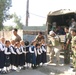 Soldiers visit students at the Gilgamish Primary Girls School in al-Doria