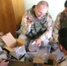 Staff Sgt. Dean Sowers explains the use of medical supplies