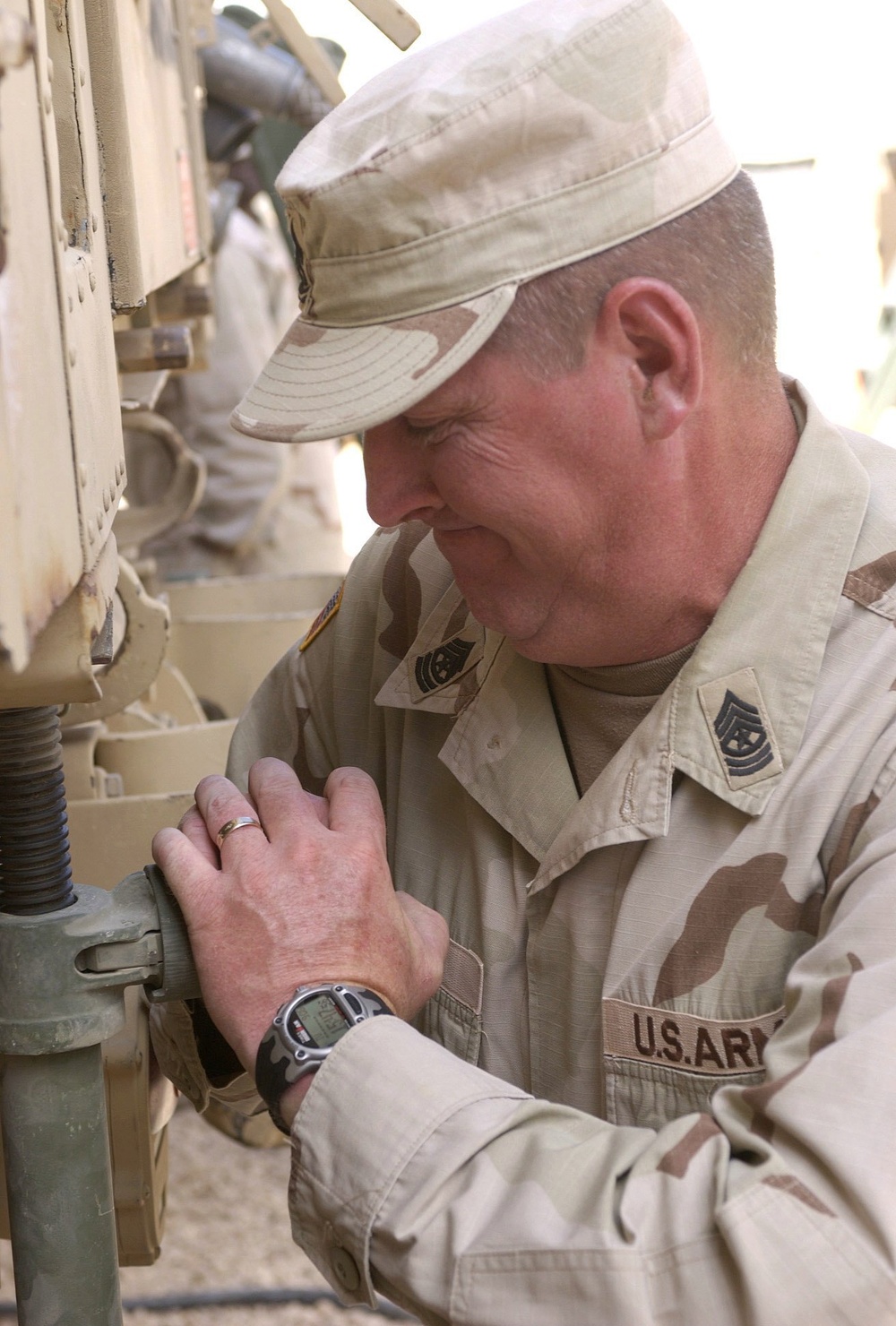 Sgt. Maj. James Addie Tightens the Supporting Elements on a  EECP Expando V