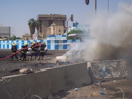 Firefighters battle to put out the blaze of car that was caught in a VBIED