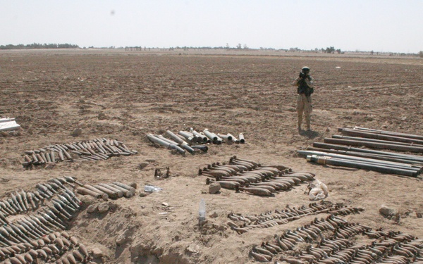 Soldiers continue to uncover munitions in a large weapons cache