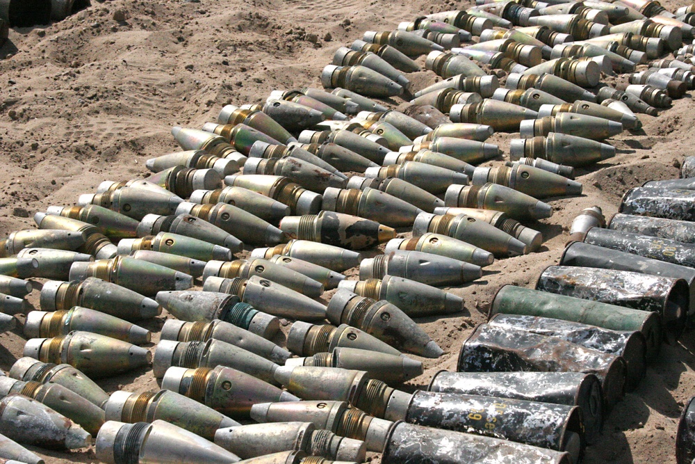 Soldiers continue to uncover munitions in a large weapons cache