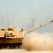 Soldiers fire an M109A6 Paladin