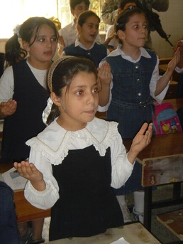 B Company, 451st Civil Affairs Battalion helps out at a local school