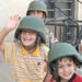 Iraqis of all ages vote, kids celebrate holiday