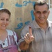 Iraqis of all ages vote, kids celebrate holiday