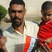 Iraqis of all ages vote, kids celebrate holiday