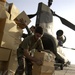 A Pakistani soldier loads a U.S. Army CH-47 &quot;Chinhook&quot; helicopter