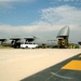 A CH-47 helicopter is loaded onto a C-5 Galaxy