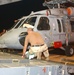 Darryll Connor Loads an MH-60 Helicopter Onto a U.S. Air Force C-17