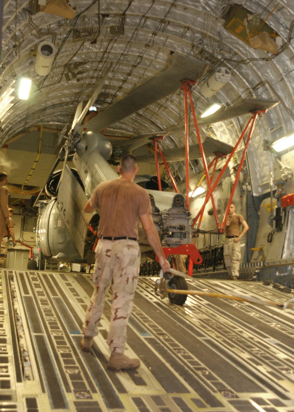 Devon Kimble Controls the Tension and Direction of an MH-60 Helicopter
