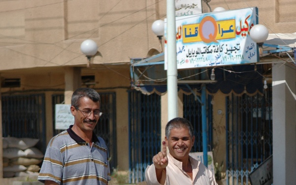 All Smiles and Ink-stained Fingers