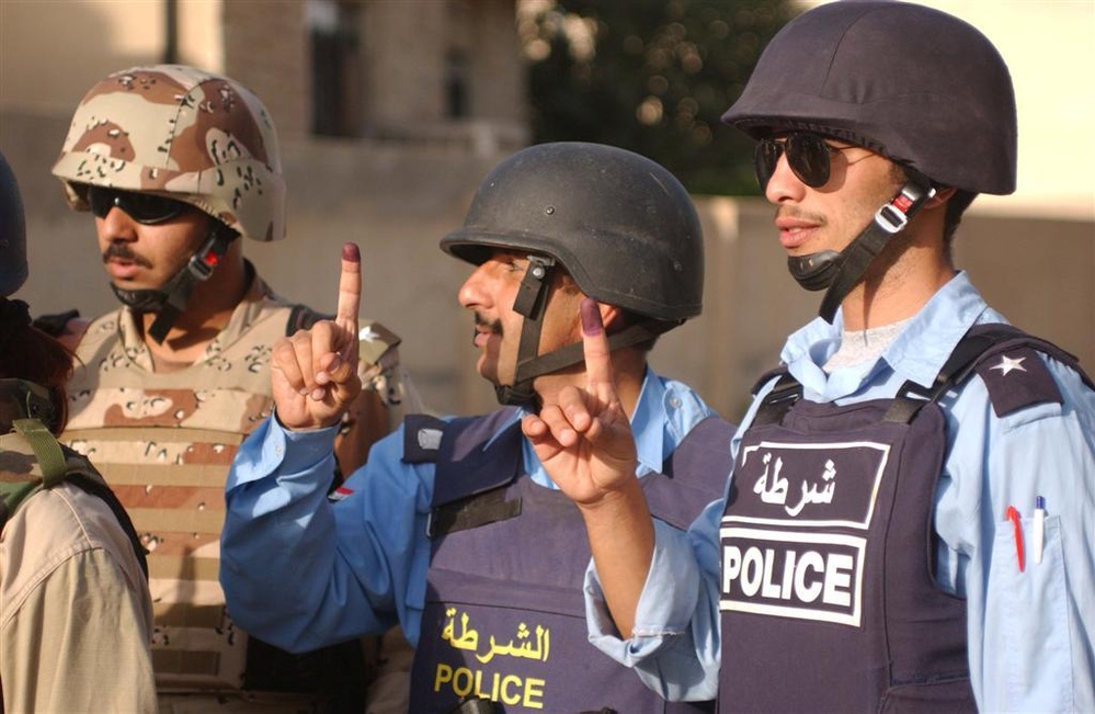 Iraqi police show that they also voted