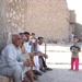 A group of Iraqi men talk to Lt. Col. Gibson