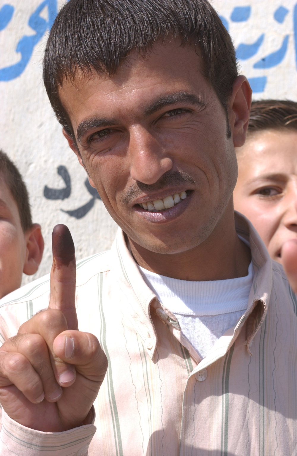 An ink-stained finger is the mark of a voter