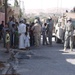 Lt. Col. Gibson talks to a crowd of people in Tall Afar